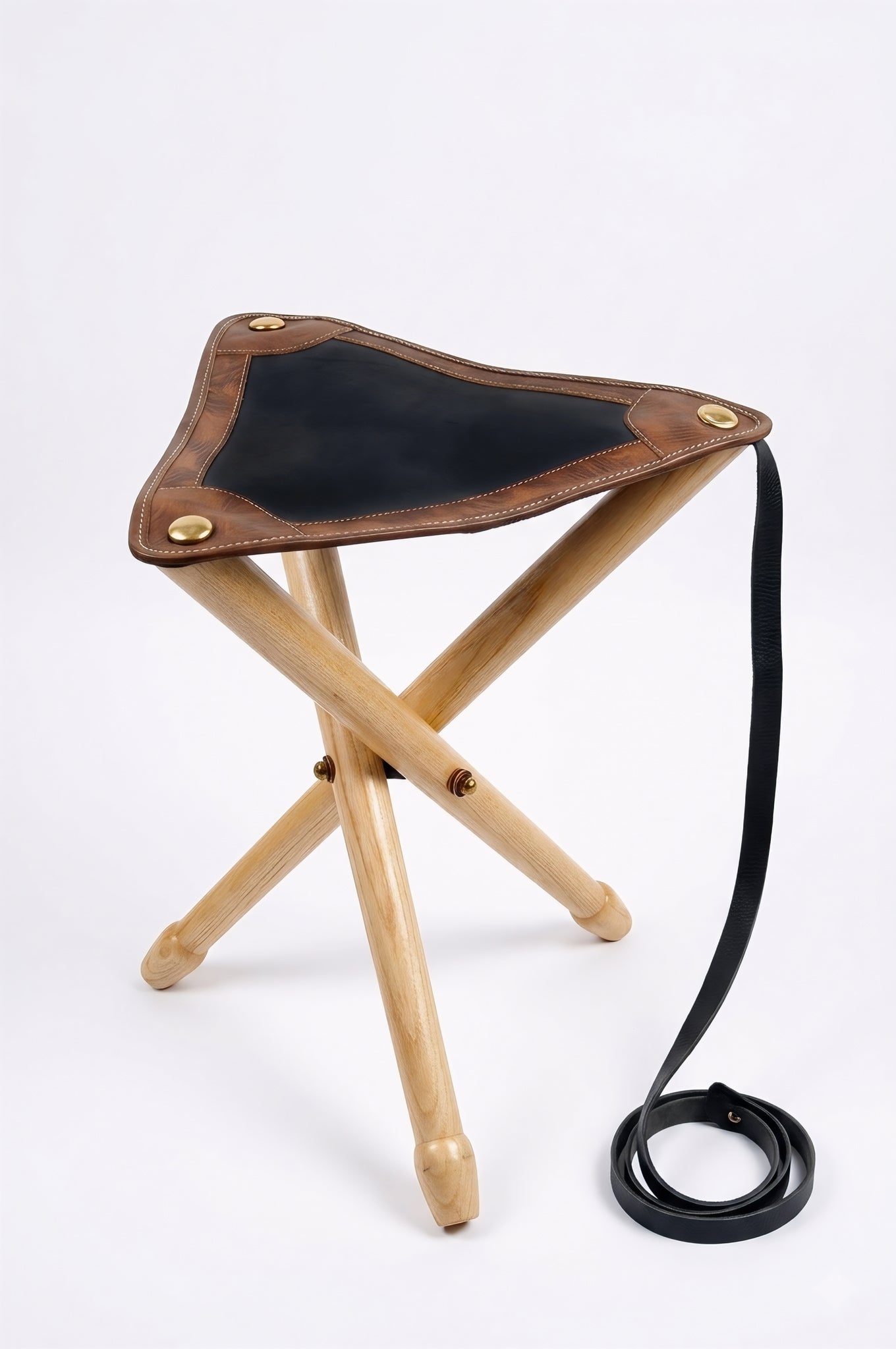 The Huntra Artisan Two-Tone Leather Tripod Stool