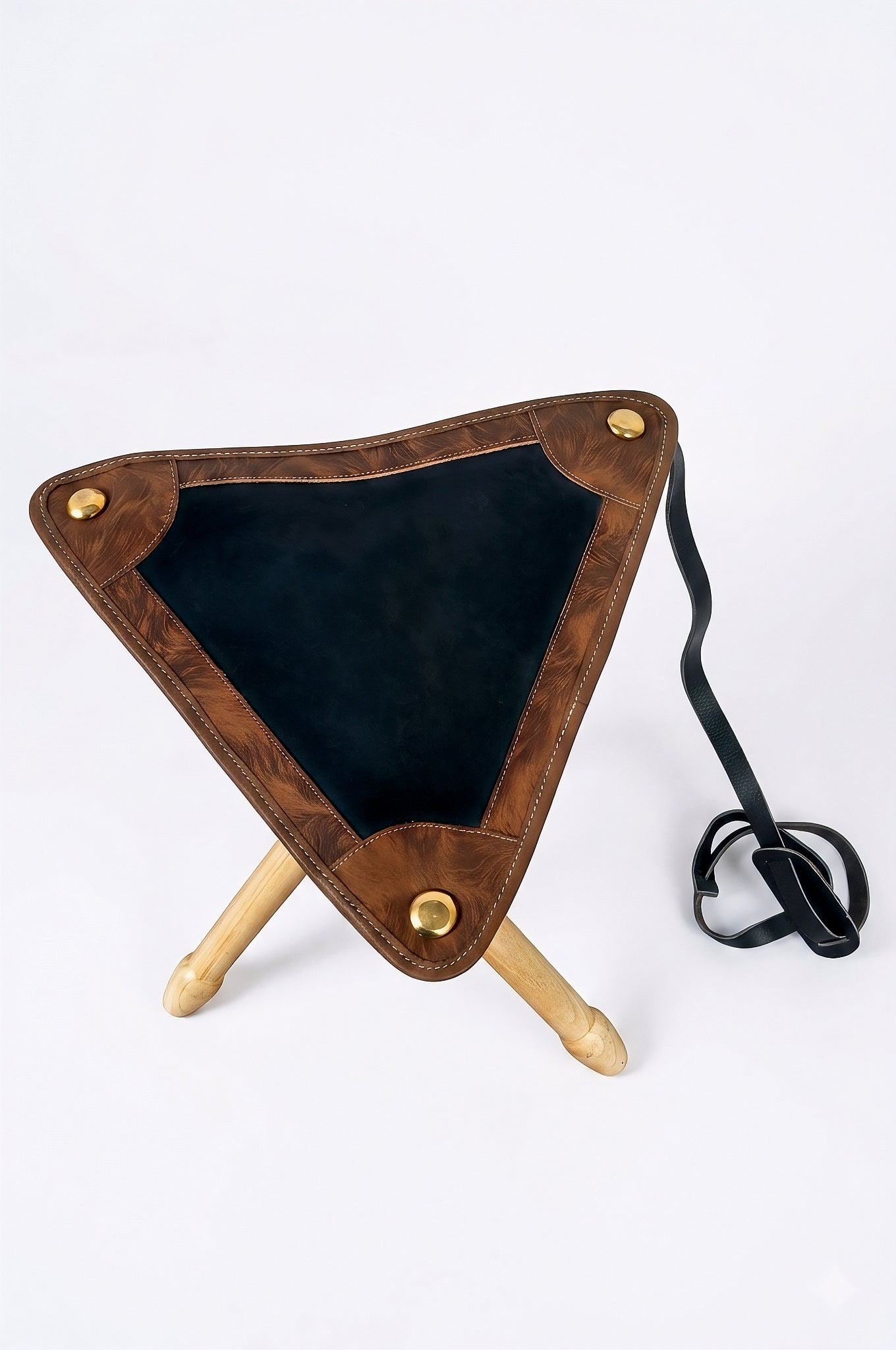The Huntra Artisan Two-Tone Leather Tripod Stool