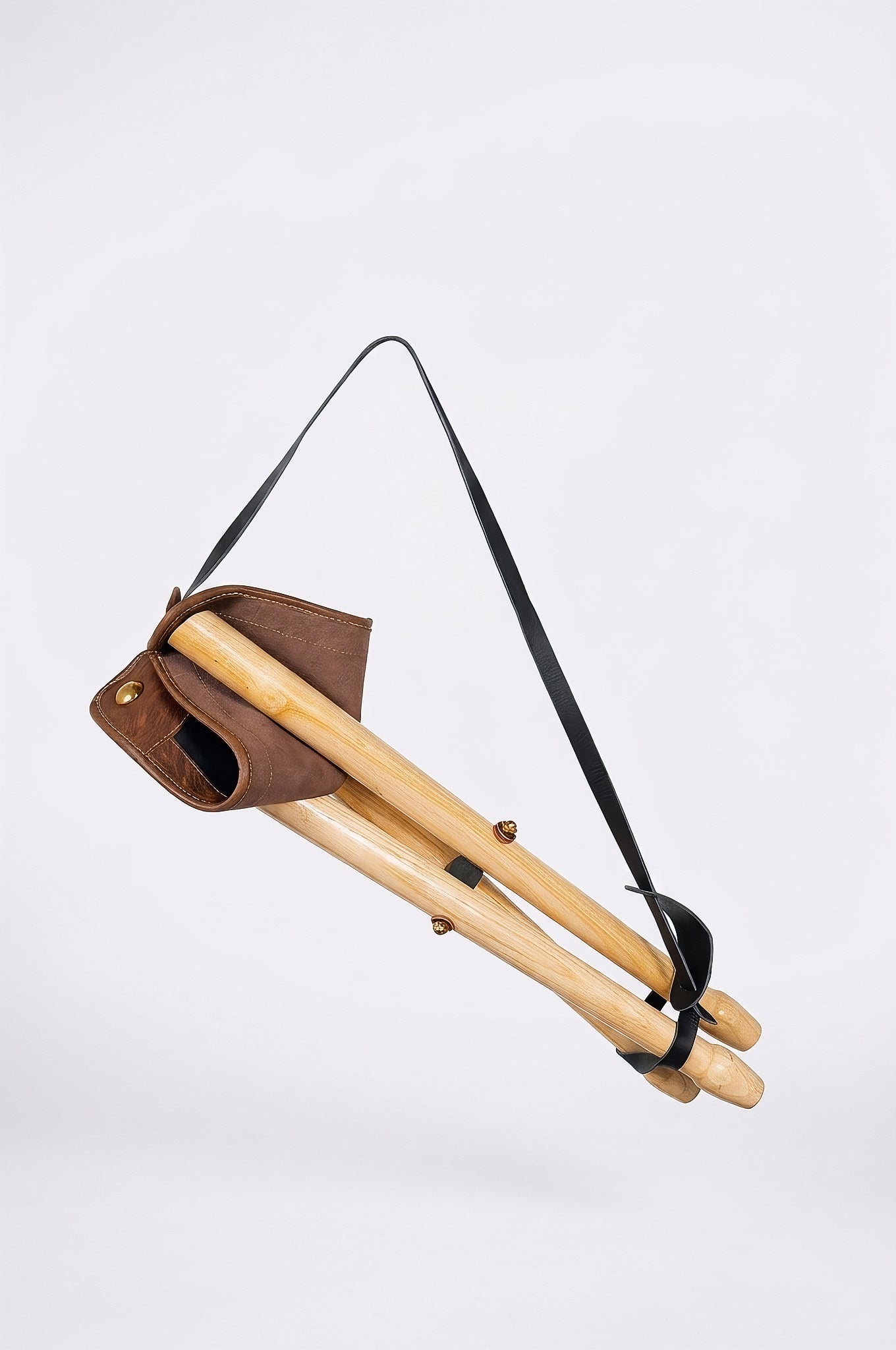 The Huntra Artisan Two-Tone Leather Tripod Stool